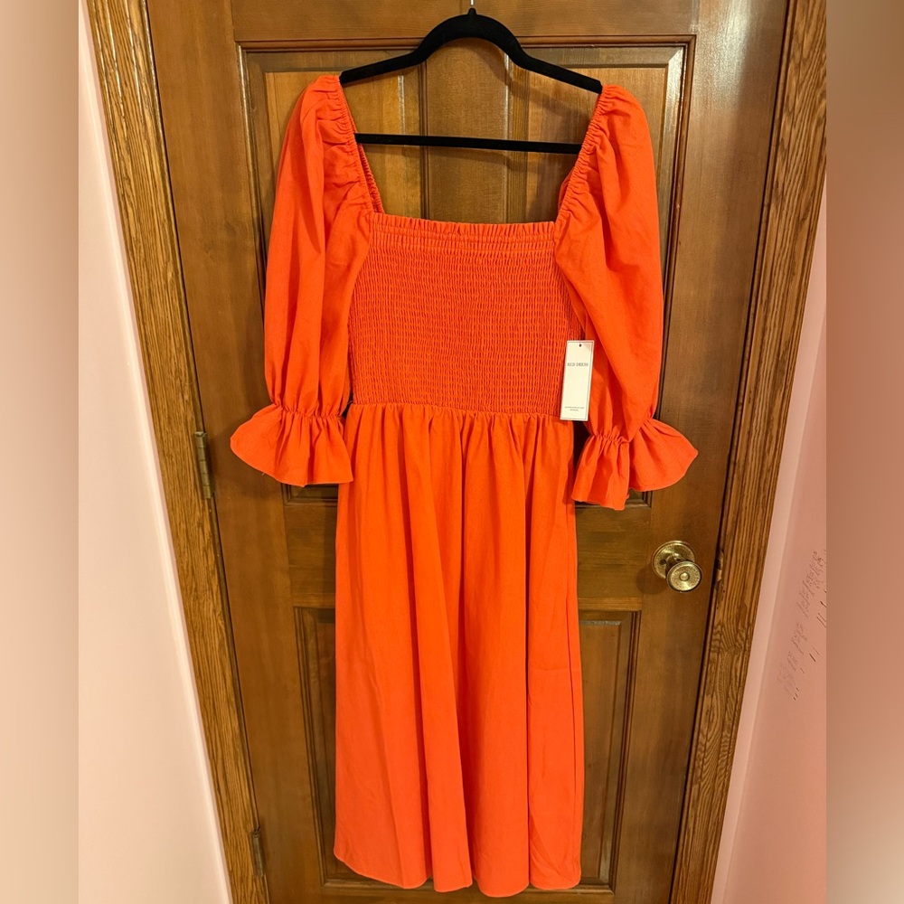 Aura Orange Midi Dress with Smocked Bodice and Puff Sleeves